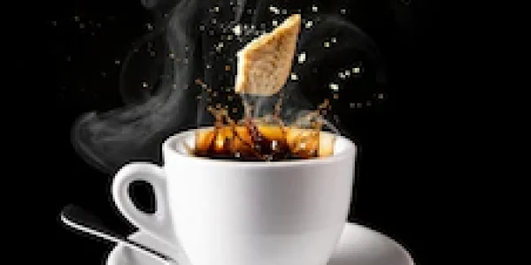 vertical-shot-hot-coffee-with-waffles_181624-43126.webp